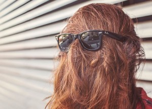 Photo of person with their face covered with head hair. Courtesy of gratisography.com