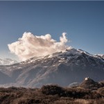 Photo of mountains and sky with castle. Courtesty of Splitshire.com