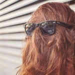 Photo of person with their face covered with head hair. Courtesy of gratisography.com
